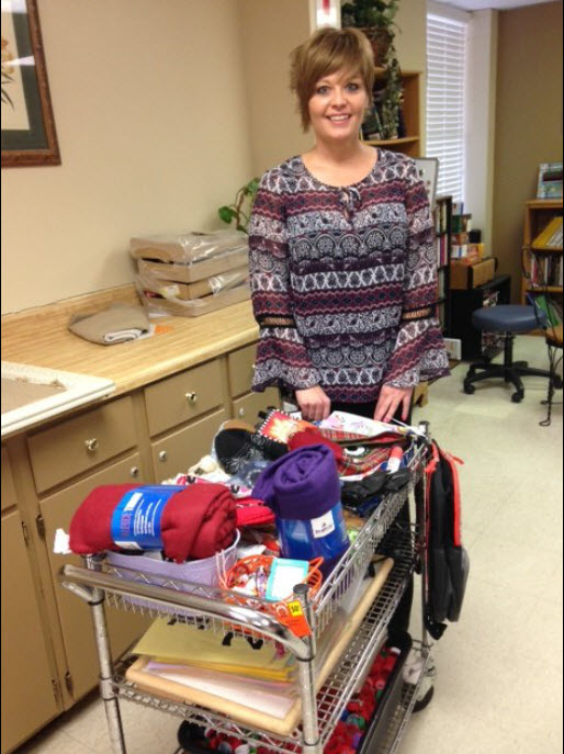 Woman with donations for nursing home